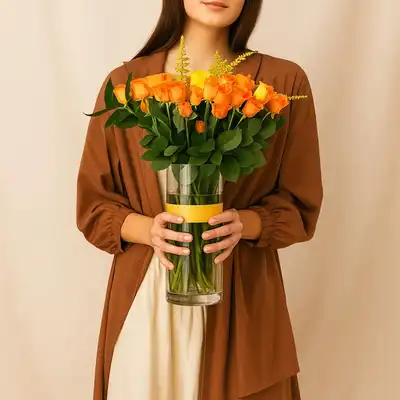 Orange And Yellow Rose Arrangement In A Vase