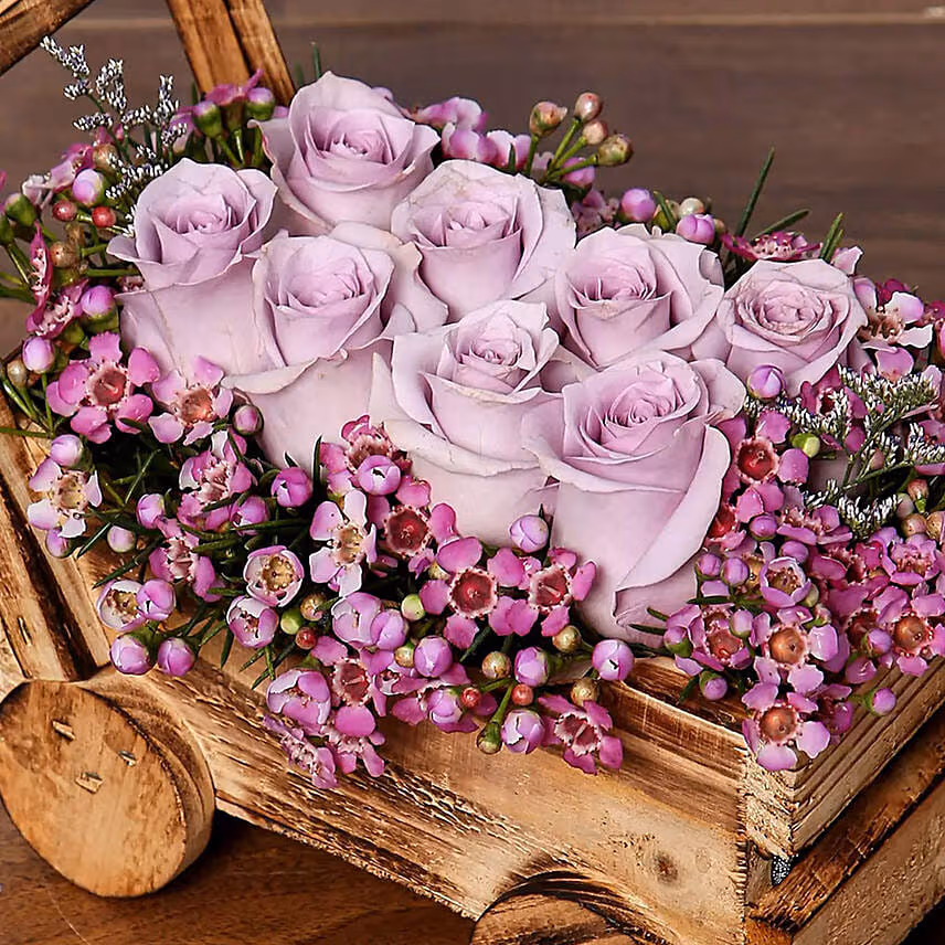 Purple Roses Beautifully Arranged In Cart