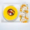 Exquisite Tropical Mango Tango Cake with Elegant Floral Arrangement