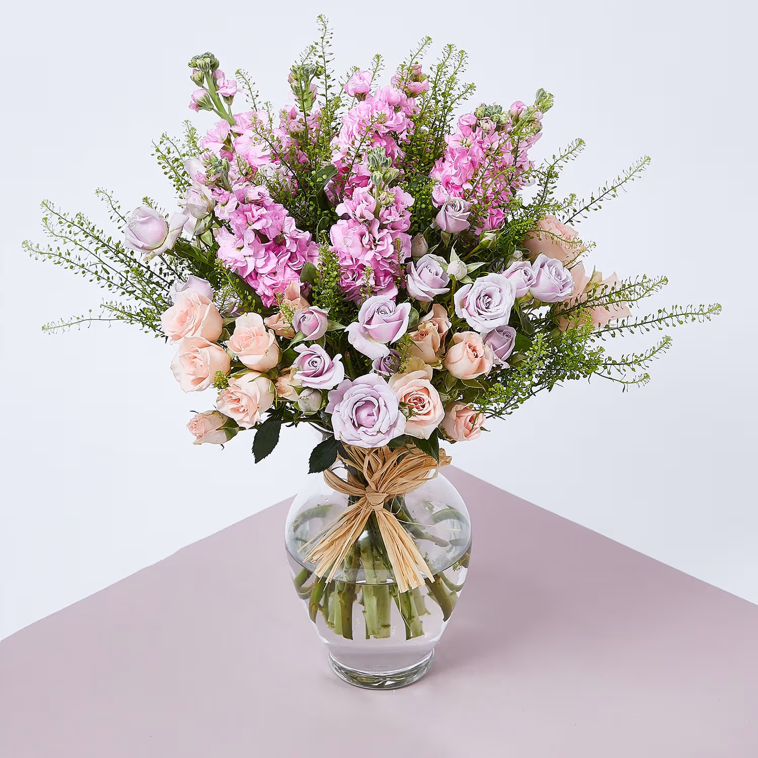 Elegant Pastel Floral Arrangement in Glass Vase