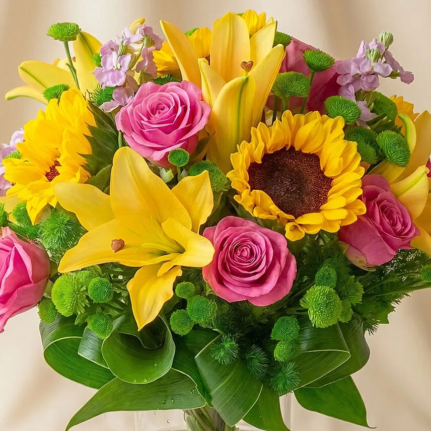 Sparkling Bunch of Flowers In Glass Vase