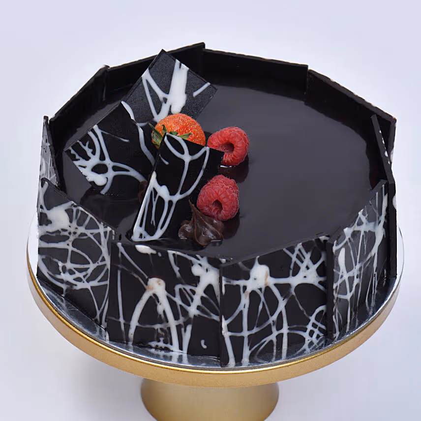 Elegant Red Roses & Indulgent Fudge Cake Combo - Half Kg