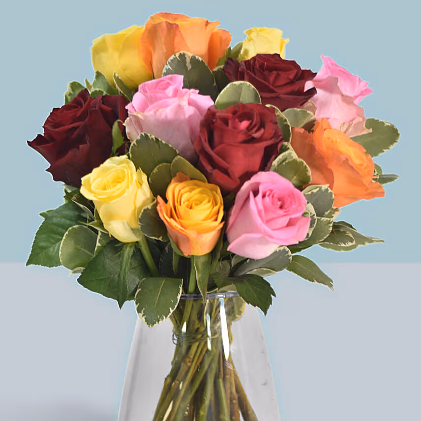 Mixed Roses Arrangement In A Glass Vase