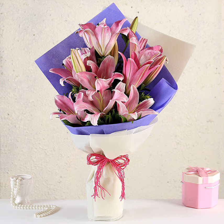 Alluring Pink Oriental Lilies Bouquet with Moet Champagne 200ml