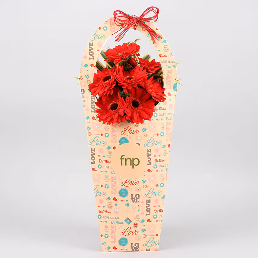 Red Gerberas In FNP Love Sleeve