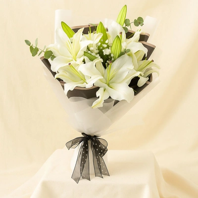 Charming White Lilies Hand Bouquet