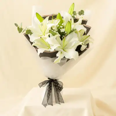 Charming White Lilies Hand Bouquet