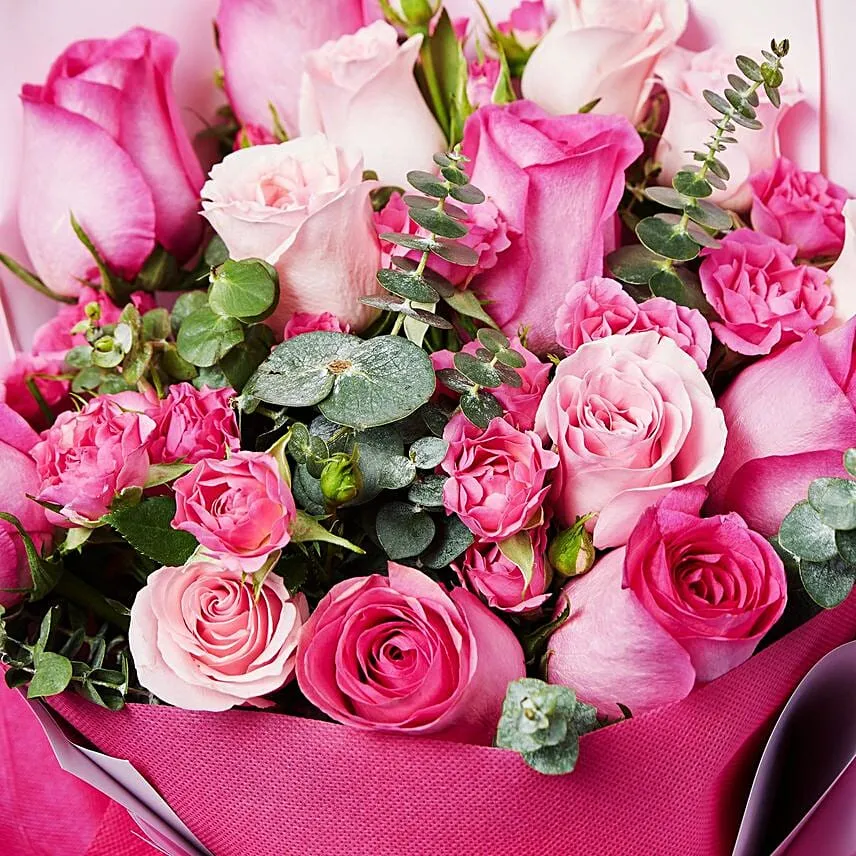 Magnificent Mixed Roses Wrapped Bouquet With Chocolate