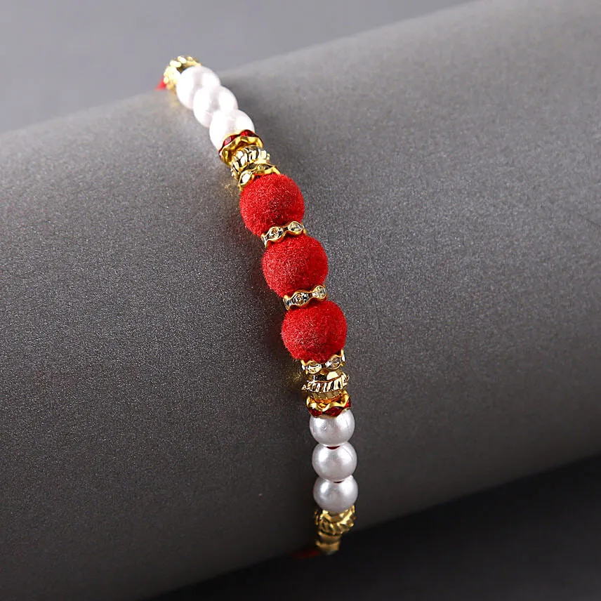 Sneh Red White Pearl Rakhi & Ferrero Rcoher