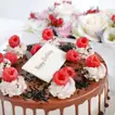 Chocolate Delight Birthday Cake with Elegant Floral Arrangement