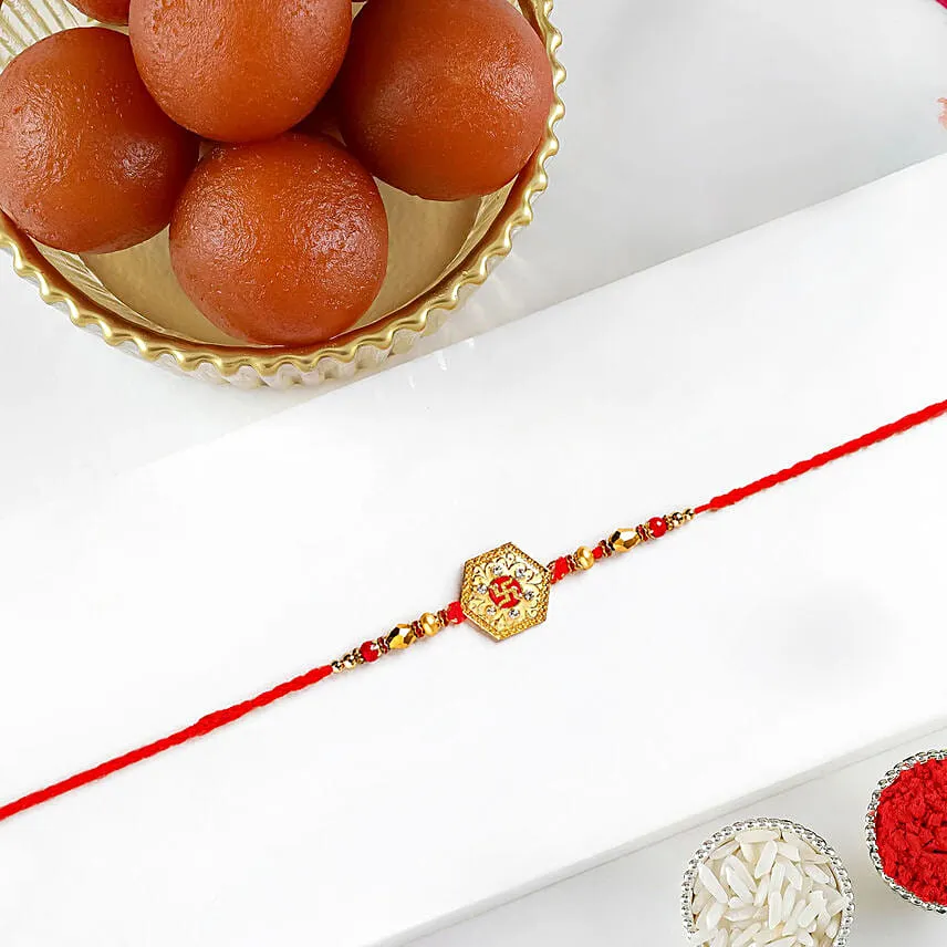 Royal Swastik Charm Rakhi with Gulab Jamun