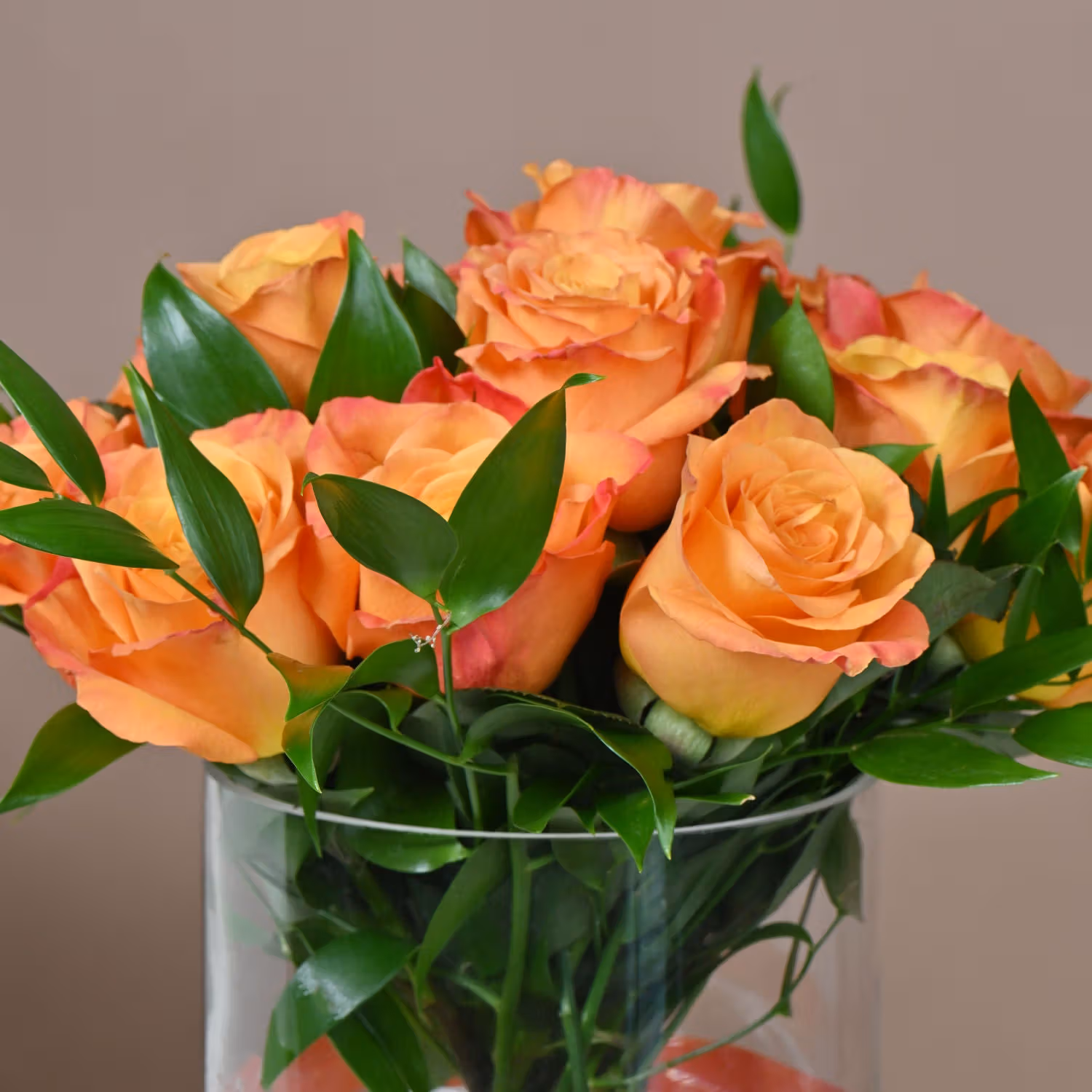 Orange Roses in Glass Vase