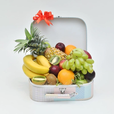 Deluxe Exotic Fruit Hamper in Elegant Floral Suitcase