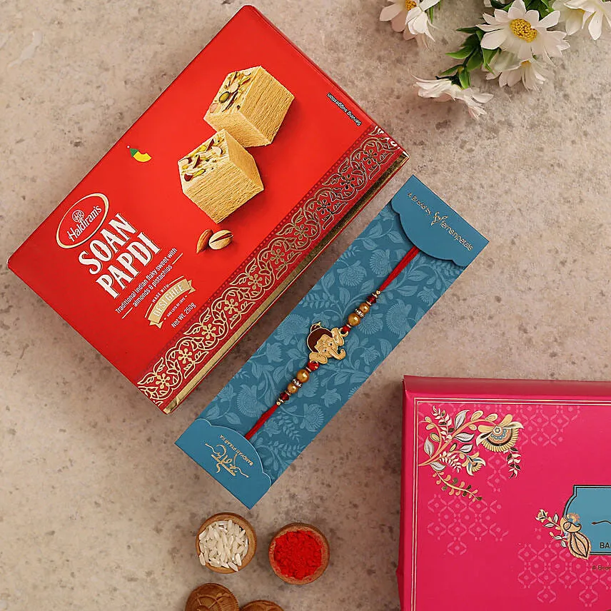 Long Trunk Bal Ganesha Kids Rakhi And Soan Papdi