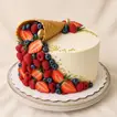 Decadent Chocolate Ice Cream Cone Cake with Fresh Berries & Golden Pearls