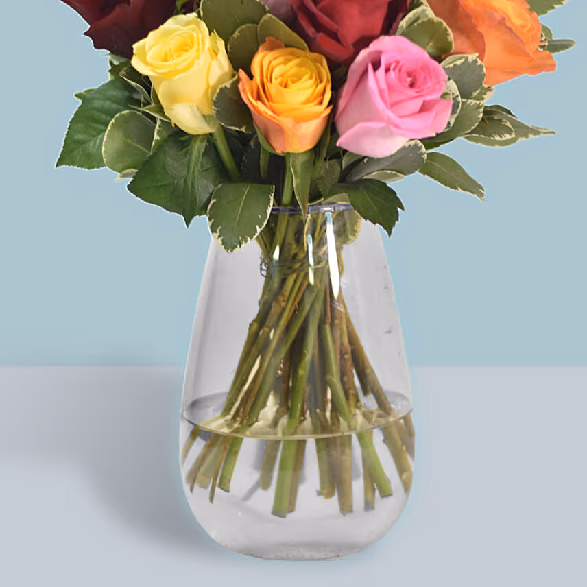 Mixed Roses Arrangement In A Glass Vase