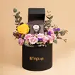 Titan Quartz Analog Men's Watch with Silver Dial and Stainless Steel Strap, Presented in an Elegant Floral Arrangement