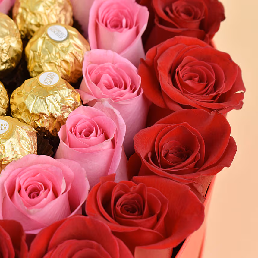 Roses and Chocolate In a Heart Shaped Box