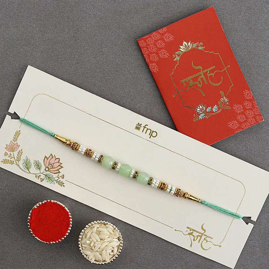 Graceful Pearl Ethnic Rakhi Green