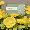 Elegant Yellow Floral Arrangement with Gourmet Chocolates