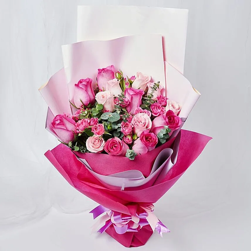 Magnificent Mixed Roses Wrapped Bouquet With Chocolate