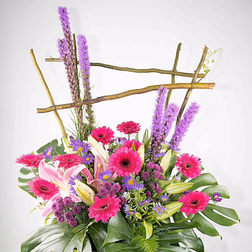 Alluring Mixed Flowers Green Cardboard Stand