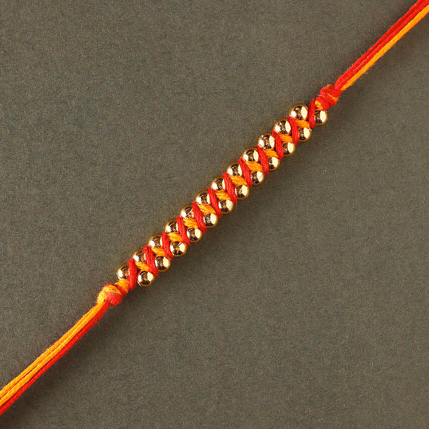 Sneh Elegant Gold Rakhi with Soan Papdi