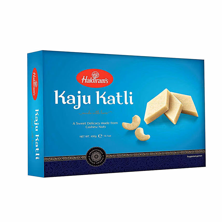 Designer Deepavali Diyas With Lindt And Kaju Katli