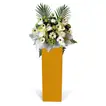 Alluring Mixed Flowers Arrangement In Brown Stand