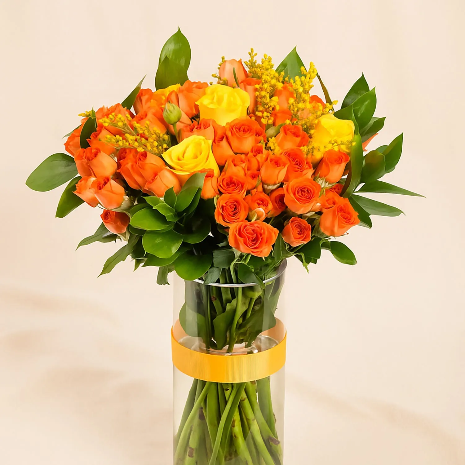 Orange And Yellow Rose Arrangement In A Vase For Graduation