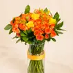 Orange And Yellow Rose Arrangement In A Vase For Graduation