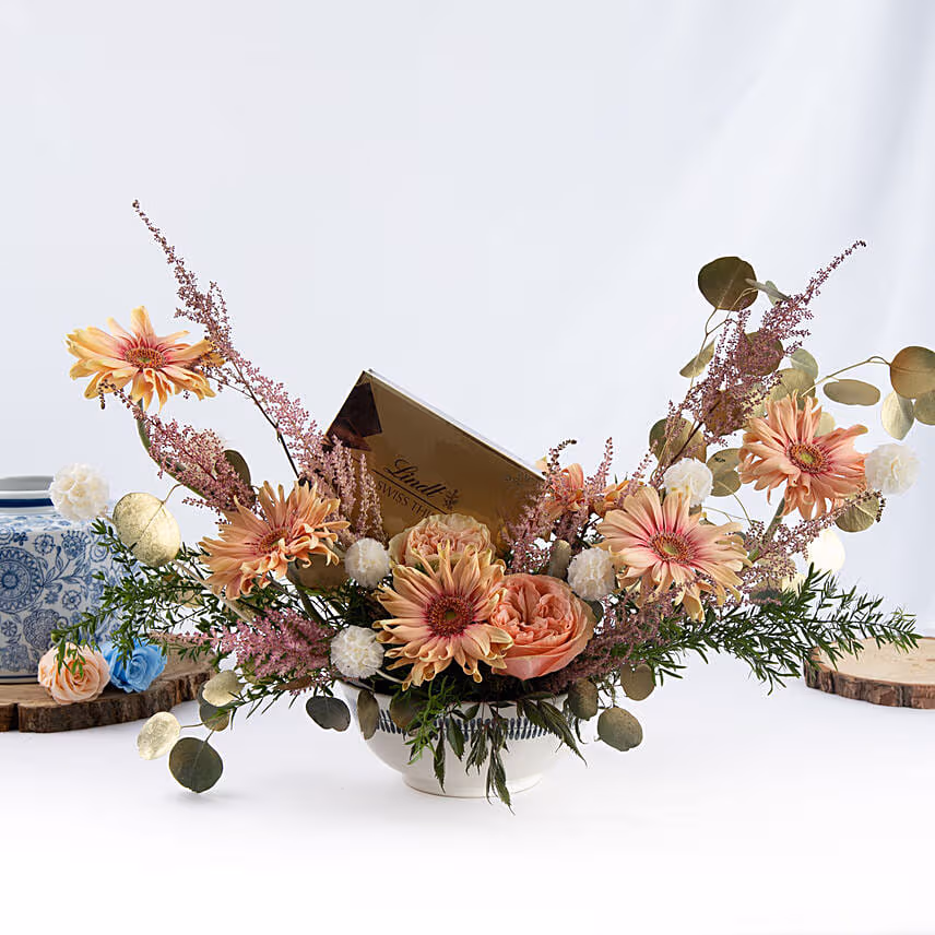 Ravishing Flowers Arrangement and Chocolate