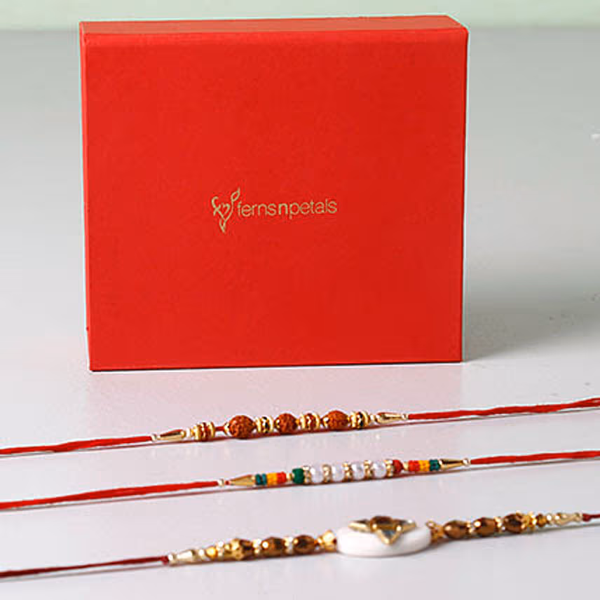Set of 3 Vibrant Rakhis In Red Box