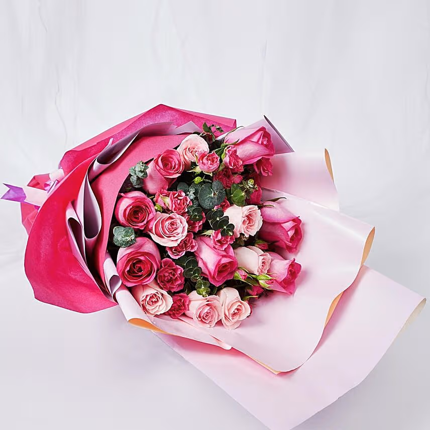 Magnificent Mixed Roses Wrapped Bouquet With Cake