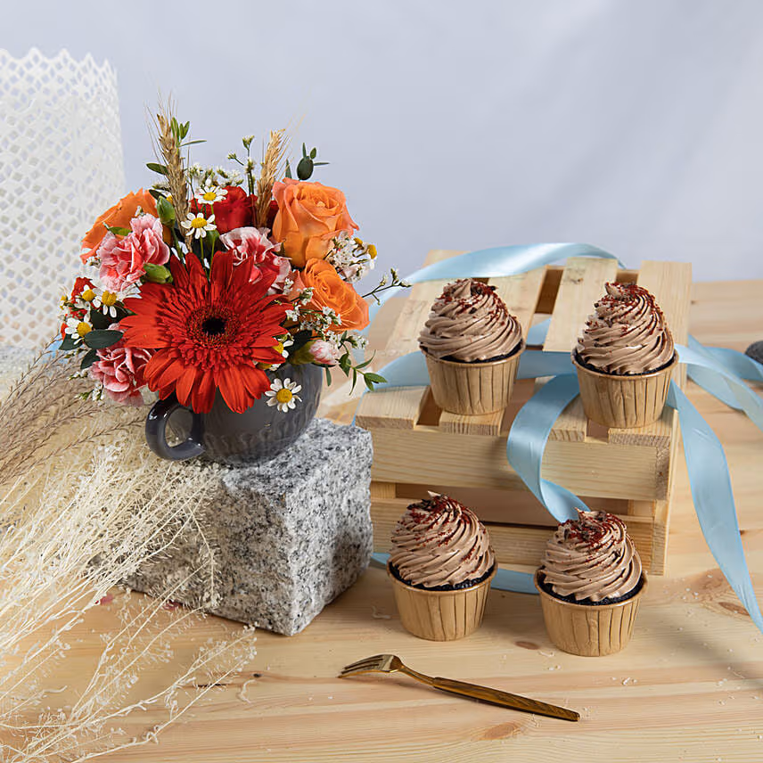 Flowers arrangment with Chocolate Cupcakes
