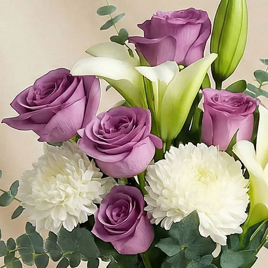 Lovely Mixed Flowers Oval Shaped Vase