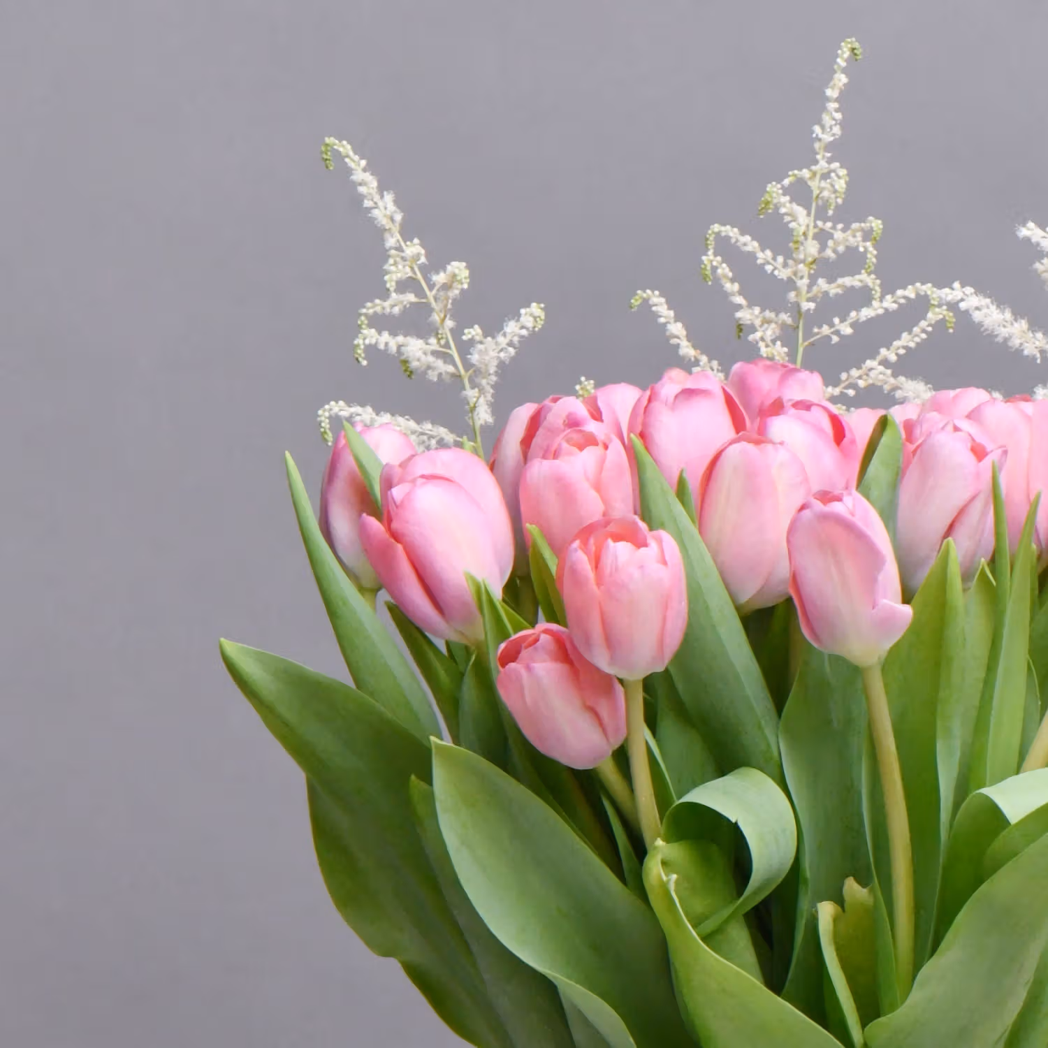 Exquisite Pink Tulips in Fish Bowl Vase