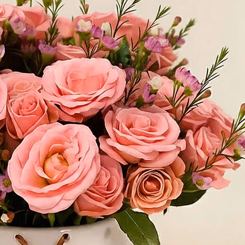 Pink Perfection Blooms Roses in White Heart Vase