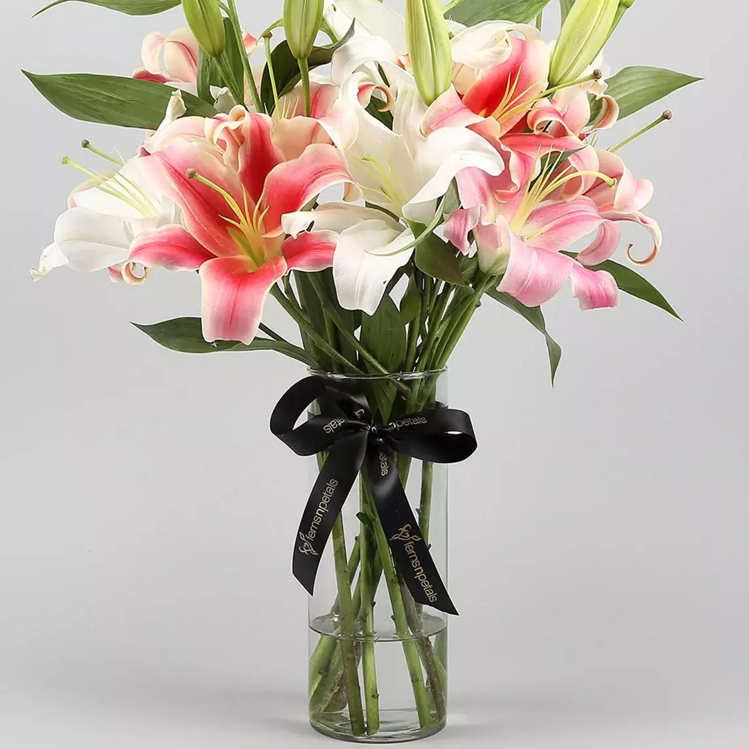 Elegant White and Pink Lily Arrangement in Glass Vase