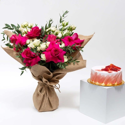 Exquisite Hand Bouquet in Jute Wrap with Strawberry-Topped Chocolate Cake
