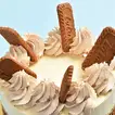 Exquisite Tiered Caramel Dream Cake with Crunchy Biscuit Toppings