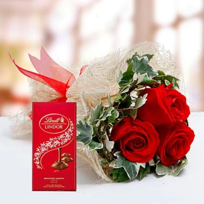 Luxurious Red Roses Bouquet with Lindt Milk Chocolate Delight