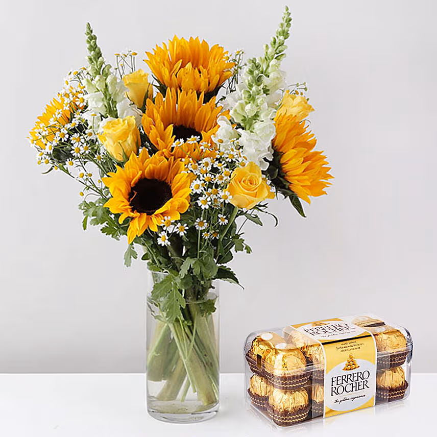 Alluring Mixed Flowers Glass Vase With Chocolate