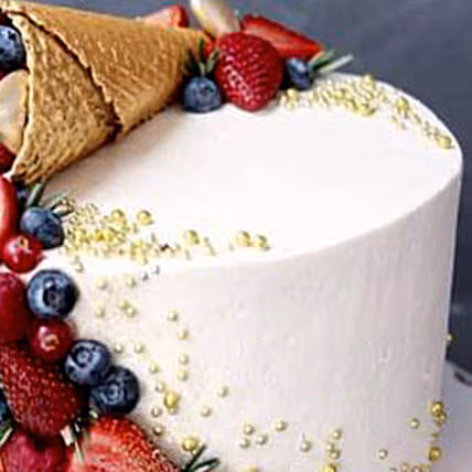 Decadent Chocolate Ice Cream Cone Cake with Fresh Berries & Golden Pearls