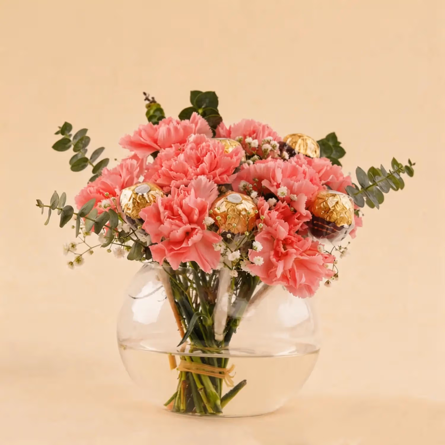 Elegant Pink Carnation Bouquet with Ferrero Rocher in Glass Vase