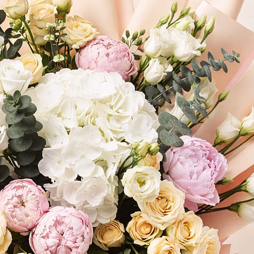 Ravishing Mixed Flowers Wrapped Bouquet