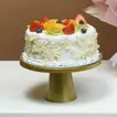 Whispering Love: A Delightful Bouquet and Fresh Fruit Cake Combo