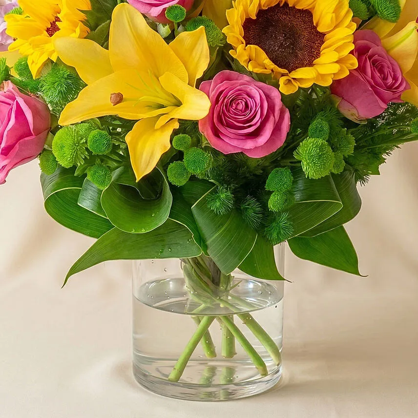 Sparkling Bunch of Flowers In Glass Vase
