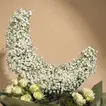 Hilal Al Noor Floral Arrangement with Gourmet Chocolates