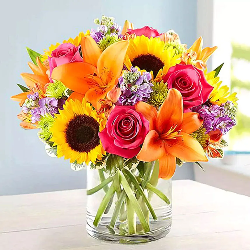 Vivid Bunch Of Flowers With Cake